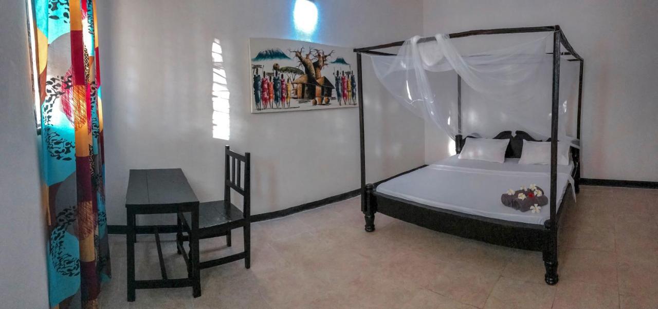 Papaya Guest House Нунгви Екстериор снимка