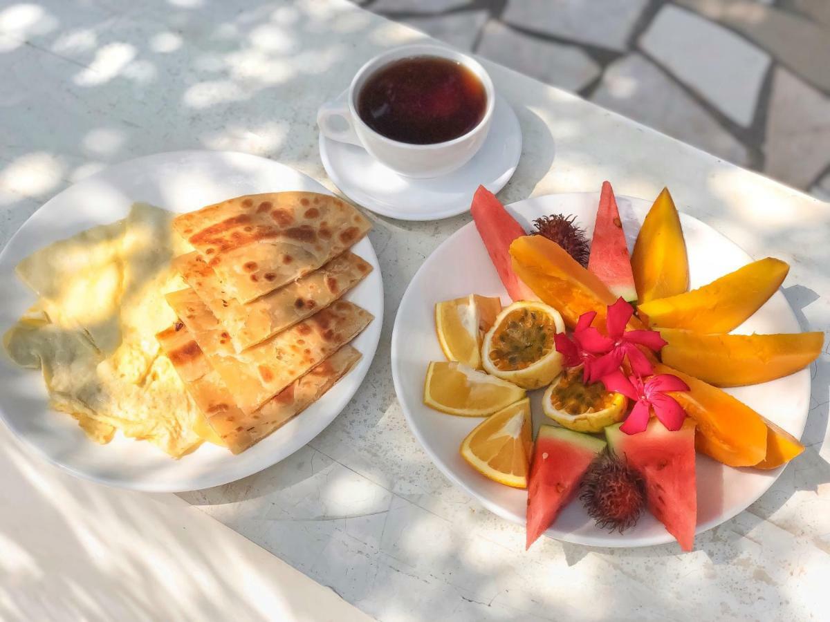 Papaya Guest House Нунгви Екстериор снимка