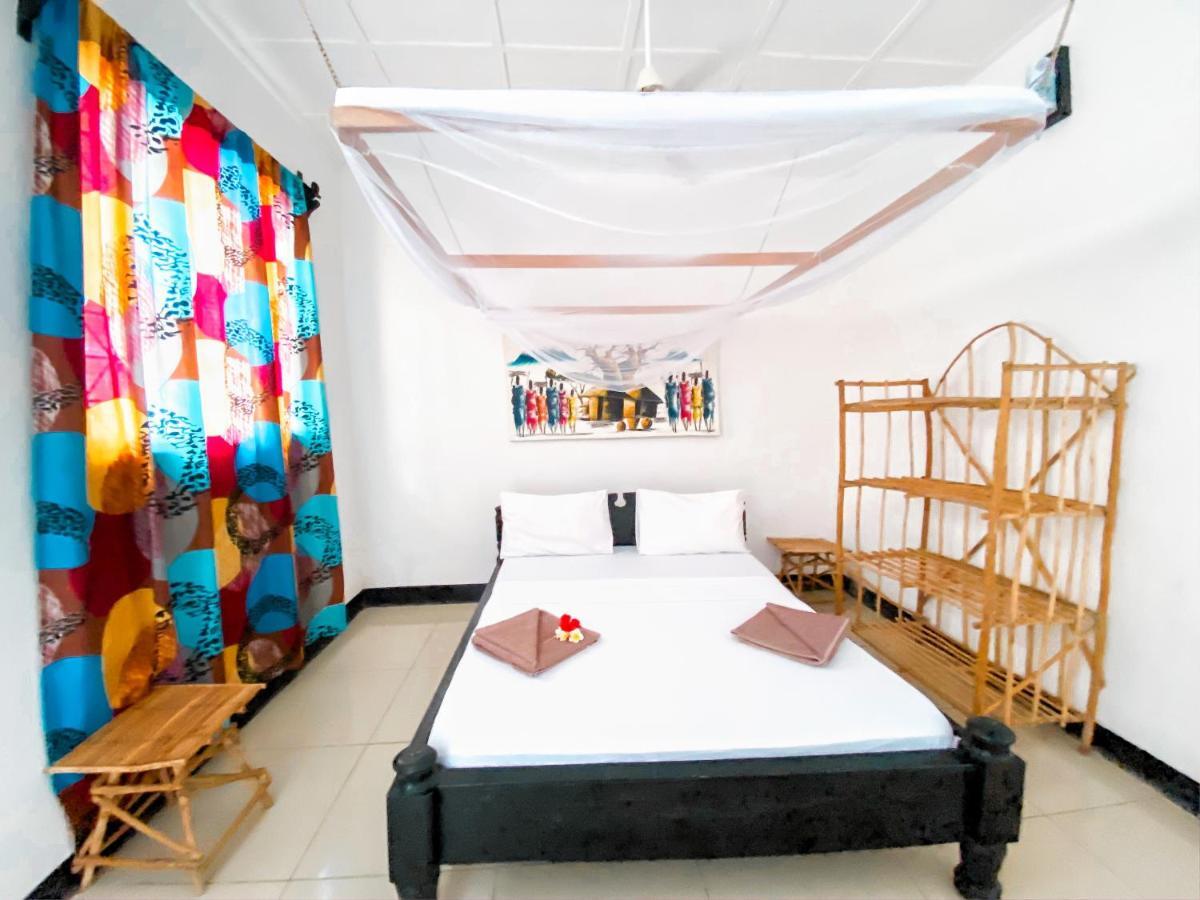 Papaya Guest House Нунгви Екстериор снимка