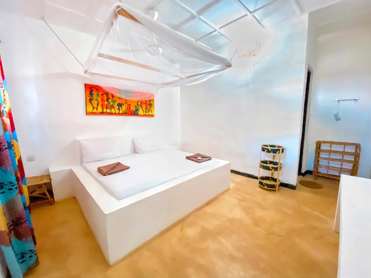 Papaya Guest House Нунгви Екстериор снимка